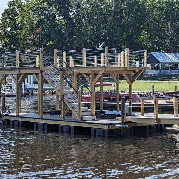 Dock repair specialists working on a Lake Norman pier